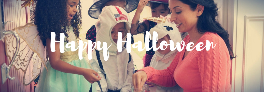 kids trick or treating with Happy Halloween text