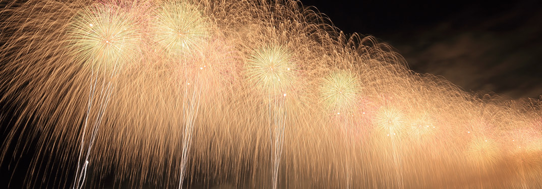 line of gold fireworks on New Year's Eve