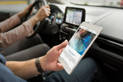 Person using Wi-Fi in Ford vehicle