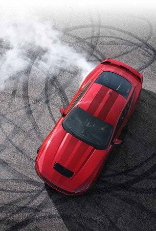 Overhead view of a 2024 Ford Mustang® model with tire tracks on pavement | Wade Ford in Smyrna GA
