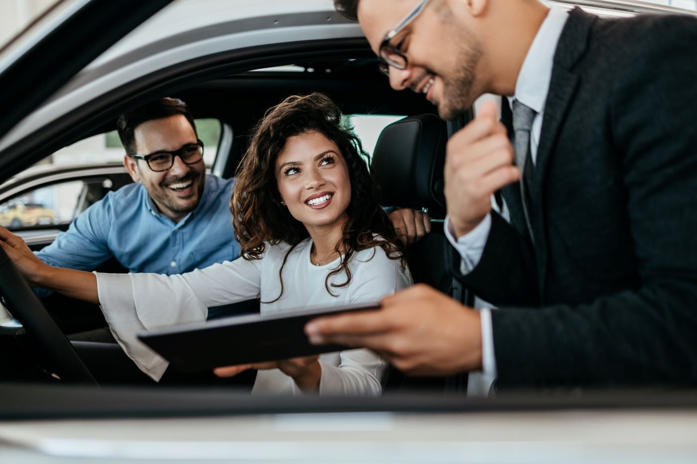 Couple Test Driving Ford SUV at Car Dealership near Kennesaw, GA | Wade Ford.